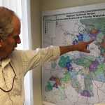 In this Dec. 7, 2016 photo, U.S. Forest Service District Ranger Dave Halemeier describes plans for part of the Malheur National Forest in John Day, Ore. The armed takeover of the Malheur National Wildlife Refuge headquarters caused a sensation and global headlines, but a quieter and perhaps more important struggle is being waged by those trying to use the levers of power, and not firearms.(AP Photo/Andrew Selsky)