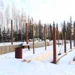 Photo by Megan Pacer/Peninsula Clarion A sign displays the anticipated opening of Everett's Acres Farm and Feed to drivers on the Kenai Spur Highway on Wednesday, Dec. 14, 2016 outside of Charlie's Pizza in Nikiski, Alaska. The restaurant's owner, Steve Chamberlain, will close shop on Jan. 1, 2017 and begin the transition to the new business that will sell a variety of animal feed and fresh produce grown by Chamberlain in an on-site greenhouse.