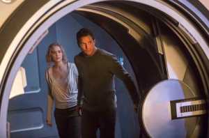 This image released by Columbia Pictures, Jennifer Lawrence, left, and Chris Pratt in a scene from the film, Passengers." (Jaimie Trueblood/Columbia Pictures/Sony via AP)
