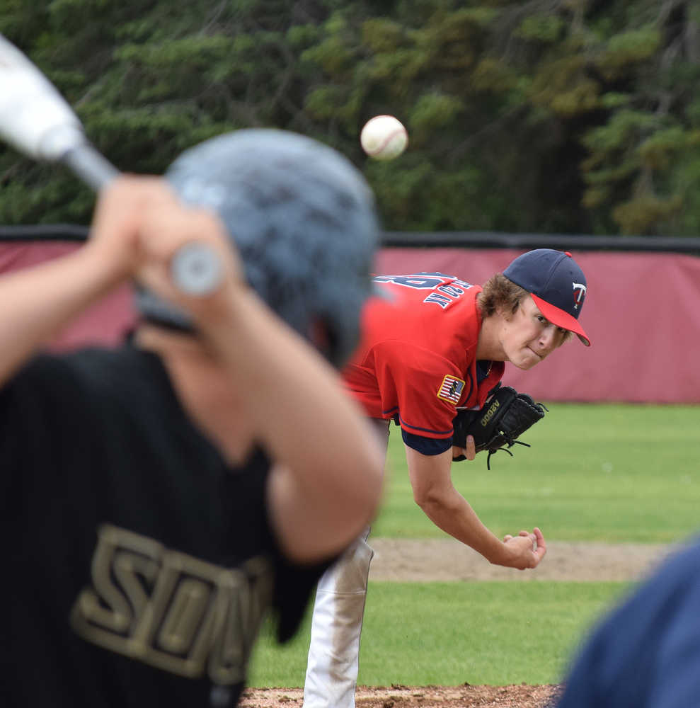 Photo by Joey Klecka/Peninsula Clarion Post 20 Twins pitcher Joey Becher delivers a pitch to a South batter, July 2 at the Kenai Little League fields.