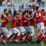 Photo by Joey Klecka/Peninsula Clarion The Kenai Central boys soccer team celebrates its semifinal victory over Service, May 27 at the state soccer championships at Service High School.