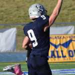 Photo by Joey Klecka/Peninsula Clarion Soldotna's Jace Urban points skyward as he scores on North Pole in Saturday's medium-schools semifinal game at Palmer High School.