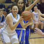 Photo by Joey Klecka/Peninsula Clarion Soldotna sophomore Danica Schmidt hounds Kodiak's Sydney Mutch for the ball in a Northern Lights Conference matchup Saturday at the Soldotna Prep gymnasium.