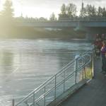 Fishermen cast for silver salmon from a boardwalk near the Soldotna Visitors Center on Wednesday, Aug. 8, 2018 in Soldotna, Alaska. (Photo by Elizabeth Earl/Peninsula Clarion)