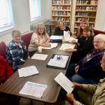 Sterling Area Senior Citizens Inc. board members and volunteers Linda Bond, Sandy Bailey, Janet Jones, Jacquie Turpin, Kristie Bass, Lynn Near, Dee Duvall and Dale Lundell met to discuss plans for the Sterling Street Fair at the Sterling Senior Center in Sterling, Alaska, on Monday, Aug. 13, 2018. (Photo by Victoria Petersen/Peninsula Clarion)