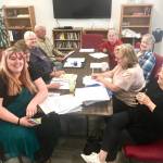 Sterling Area Senior Citizens Inc. board members and volunteers Kristie Bass, Lynn Near, Dee Duvall, Dale Lundell, Linda Bond, Sandy Bailey, Janet Jones and Jacquie Turpin met to discuss plans for the Sterling Street Fair at the Sterling Senior Center in Sterling, Alaska, on Monday, Aug. 13, 2018. (Photo by Victoria Petersen/Peninsula Clarion)