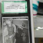 A sign noting that proceeds rom a 4-H livestock auction at the Kenai Peninsula Fair will go to support veterinarian Dr. Jerry Nybakken stands on a table at the Ninilchik Fairgrounds on Saturday, Aug. 18, 2018 in Ninilchik, Alaska. (Photo by Elizabeth Earl/Peninsula Clarion)