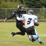 Nikiski junior Noah Litke attempts to tackle Valdez back Owen Chadwick (3) Saturday at Nikiski High School. (Photo by Joey Klecka/Peninsula Clarion)