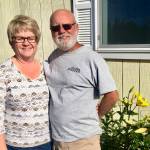 Laurie and Brian Olson at their farm on Wednesday, Aug. 15, 2018, near Soldotna, Alaska. The couple was recently named Farm Family of the Year by the Alaska State Fair. (Photo by Victoria Petersen/Peninsula Clarion)