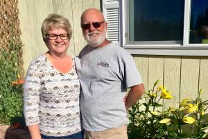Laurie and Brian Olson at their farm on Wednesday, Aug. 15, 2018, near Soldotna, Alaska. The couple was recently named Farm Family of the Year by the Alaska State Fair. (Photo by Victoria Petersen/Peninsula Clarion)