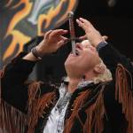 Sword swallower Dan Meyer demonstrates the technique during a show at the Kenai Peninsula Fair on Saturday, August 18, 2018 in Ninilchik, Alaska. (Photo courtesy Ben Boettger)