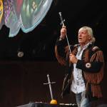 Sword swallower Dan Meyer shows a sword to his audience during a show at the Kenai Peninsula Fair on Saturday, August 18, 2018 in Ninilchik, Alaska. (Photo courtesy Ben Boettger)
