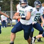 Redington quarterback Kyler Rumfelt looks for an open receiver Friday at Nikiski High School. (Photo by Joey Klecka/Peninsula Clarion)