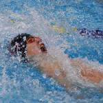 Kenai Centrals Savaii Heaven races to the third-place finish in the boys 100-yard backstroke Nov. 4, 2017, at the ASAA First National Bank State Swimming & Diving Championships at the Bartlett High pool. (Photo by Joey Klecka/Peninsula Clarion)