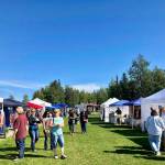 Marketgoers were met with sunshine and clear skies on the last day of the Wednesday Market on Wednesday, Aug. 29, 2018, in Soldotna, Alaska. (Photo by Victoria Petersen/Peninsula Clarion)