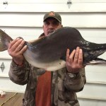 Robert Dubar holds up the pink salmon he caught Tuesday, Aug. 23, 2016 in the Kenai River. The fish weighed in at 13 pounds, 10.6 ounces, beating out the previous state record of 12 pounds, 13 ounces, which had been set that morning by another fish from the Kenai River.
