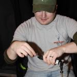 Brenden Shiflea ties a fly at Trout Unlimited workshop at Main Street Tap & Grill.