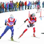 Soldotna senior Sadie Fox leads Kenai freshman Addison Gibson in Saturday's girls 4-by-3.3K relay at Kincaid Park in Anchorage.