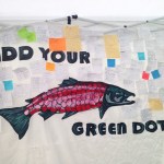 Photo by Anna Frost/Homer News Participants in Salmonfest's King Sam parade carry a giant salmon puppet throughout the festival grounds, followed by a procession of people celebrating the fish Saturday, Aug. 6, 2016 in Ninilchik, Alaska.