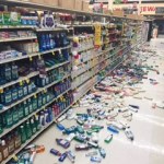 Robin and Shannon Muster relax with their daughter, six-year-old Effie, in a temporary shelter after being evacuated from their home on Lilac Lane on Sunday, Jan. 24, 2016 at the Kenai National Guard Armory in Kenai, Alaska. A 7.1 magnitude earthquake caused gas explosions on Lilac Lane.