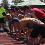 Kodiak senior Levi Thomet (foreground) prepares to take off in the 4A boys 3,200-meter race at the Alaska state track and field meet at Dimond Alumni Field in Anchorage.