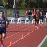 Kodiak senior Levi Thomet gaps the 4A boys 3,200 meter field at the Alaska state track and field meet at Dimond Alumni Field in Anchorage. Kenai Central senior Jonah Theisen runs second.