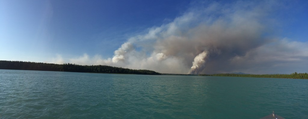 The Card Street wildfire looms over Skilak Loop Road as it makes a northeast run toward the Kenai Mountains on Wednesday, June 17, 2015 near Cooper Landing, Alaska. The road was evacuated and closed in advance of the blaze.