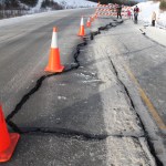 Kenai Police block off the entrance to Lilac Lane from the Kenai Spur Highway on Sunday, Jan. 24, 2016, in Kenai, Alaska. A 7.1 magnitude earthquake was felt on the peninsula and caused gas explosions in homes along Lilac Lane.