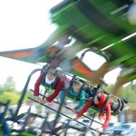 Chloe Jo Sturm, 4, fishes for fake frogs and a prize as her mother Samantha Sturm looks on during the Golden Wheel Amusements Carnival Sunday June 7, 2015 in Kenai, Alaska.