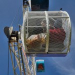 The Rock ferris wheel allows riders to spin inside of their cage as the wheel turns during the Golden Wheel Amusements carnival in Kenai, Alaska.