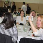 Courtney Stanley of Stanley Ford bids high & often at Taste of Kenai live auction.