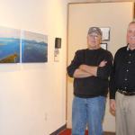 KNWR Mgr. Andy Loranger & wildlife photographer Tom Collopy at Voices of the Wilderness opening at KVCC.