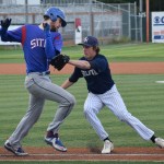 Soldotna senior Joey Becher tags out Sitka baserunner Jesse Lantiegne in a state quarterfinal Thursday at Mulcahy Field in Anchorage.