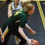 Seward&rsquo;s Ayla Lapanskas dribbles by Nikiski&rsquo;s Ayla Pitt in a Friday night game at Nikiski High School. (Photo by Joey Klecka/Peninsula Clarion)