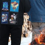 Musher Mitch Seavey pets one of his sled dogs after crossing the finish line of the Tustumena 200 Sled Dog Race on Sunday, Jan. 29, 2017 in Kasilof, Alaska. Seavey, who won the 200-mile race through the Caribou Hills in 2013, came in fourth in 26 hours and 50 minutes. (Megan Pacer/Peninsula Clarion)
