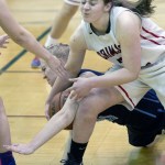 Juneau-Douglas&rsquo; Cassie Dzinich right, and Soldotna&rsquo;s Abby Kruse battle for a loose ball at Juneau-Douglas High School on Friday, Feb. 3, 2017. JDHS won 48-46. (Photo by Michael Penn/Juneau Empire)