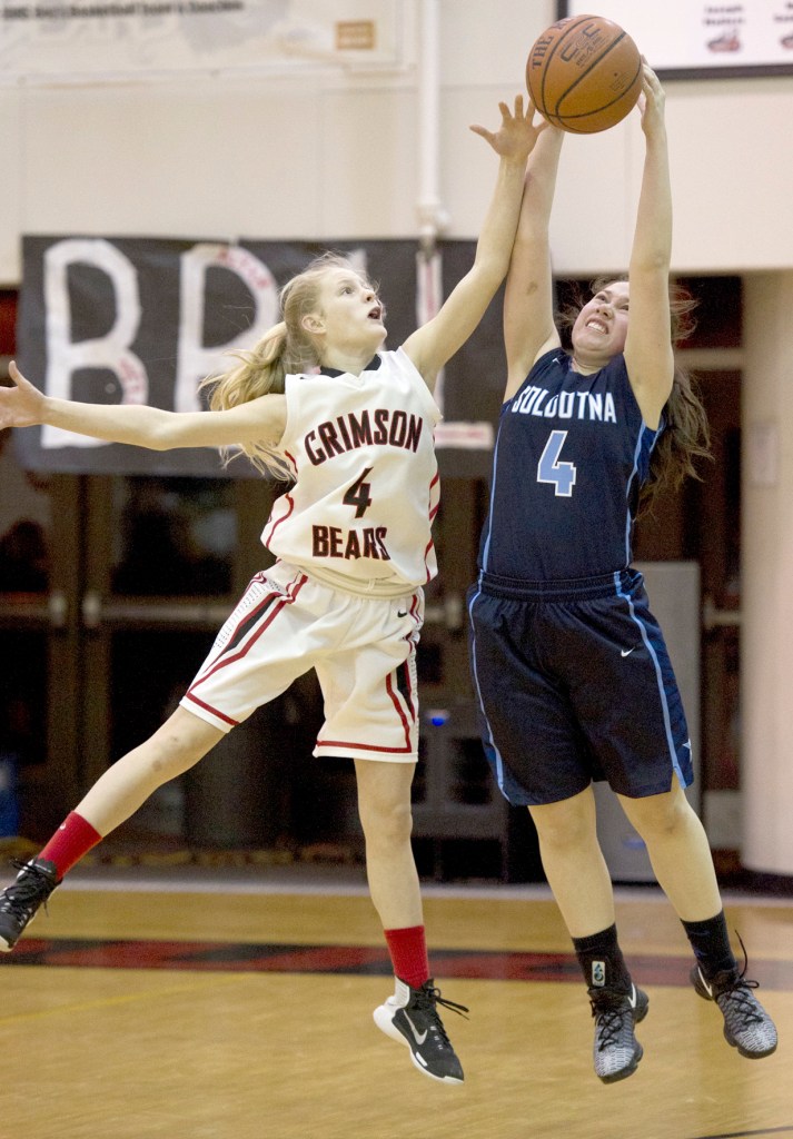 Juneau-Douglas&rsquo; Sadie Tuckwood, left, and Soldotna&rsquo;s Mei Miller go for ball at Juneau-Douglas High School on Friday, Feb. 3, 2017. JDHS won 48-46. (Photo by Michael Penn/Juneau Empire)
