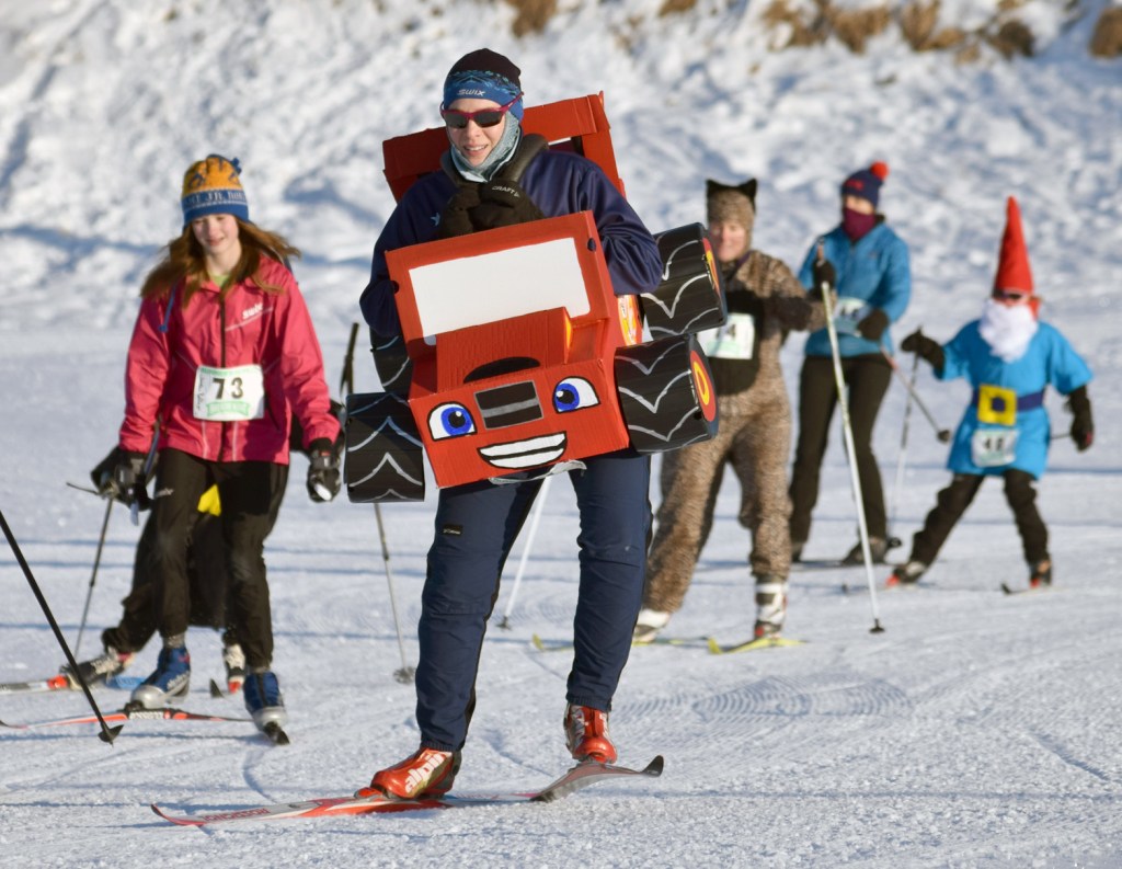Race winner Carly Reimer leads a pack of skiers Sunday at the Ski For Women at Tsalteshi Trails. (Photo by Jeff Helminiak/Peninsula Clarion)