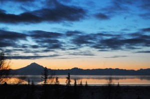 Mt. Redoubt looms over the icy Cook Inlet near the bluff on the southern shore of the Kenai River on Tuesday, Feb. 7, 2017 in Kenai, Alaska. (Elizabeth Earl/Peninsula Clarion)