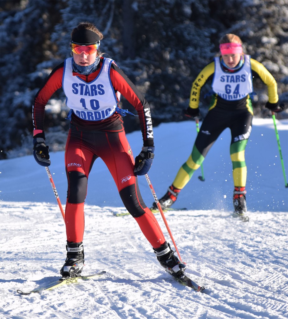 Kenai Central&rsquo;s Riana Boonstra (10) leads Seward&rsquo;s Ruby Lindquist early in Saturday&rsquo;s Kenai Peninsula Borough ski meet on the Tsalteshi Trails. (Photo by Joey Klecka/Peninsula Clarion)