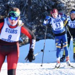 Katie Davis (53) of Homer follows behind Kenai Central&rsquo;s Katie Cooper, with Sadie Lindquist of Seward (65) behind in Saturday&rsquo;s Kenai Peninsula Borough girls race on the Tsalteshi Trails. (Photo by Joey Klecka/Peninsula Clarion)