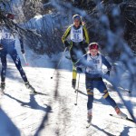 Homer skier Katie Davis (53) leads Sadie Lindquist of Seward and Soldotna&rsquo;s Kellie Arthur in Saturday&rsquo;s Kenai Peninsula Borough girls race on the Tsalteshi Trails. (Photo by Joey Klecka/Peninsula Clarion)