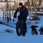 Mike Crawford of Kenai leads a group of fat tire bikers up a climb in the Caribou Hills in January. A fat tire race and ride is planned for Sunday starting at Freddie&rsquo;s Road House on Oil Well Road near Ninilchik. (Clarion file photo)