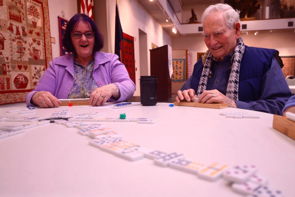 Donna Weaver (left) and her husband Dick Weaver play dominoes during the 13th annula Kenai Peninsula Senior Olympics on Thursday, Feb. 25, 2017 at the Kenai Chamber of Commerce and Visitors Center in Kenai, Alaska.