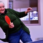 Deborah Thomas takes a swing during a game of ping pong on Saturday, Feb. 25, 2017 at the Soldotna Senior Center in Soldotna, Alaska. (Ben Boettger/Peninsula Clarion)