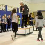 Artist in Residence Elizabeth Ware plays the role of Tatiana in Shakespeare&rsquo;s &ldquo;A Midsummer Night&rsquo;s Dream,&rdquo; while first-grade students from Kaleidoscope School of Arts and Science acted as faeries on Thursday as the culmination of Ware&rsquo;s work with the students. (Photos by Kat Sorensen/Peninsula Clarion)