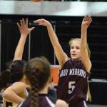 Nikolaevsk&rsquo;s Markiana Yakunin shoots a 3-pointer against King Cove on Thursday, March 16, 2017, at the Class 1A state basketball tournament at the Alaska Airlines Center in Anchorage. (Photo by Joey Klecka/Peninsula Clarion)