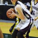 Nikolaevsk&rsquo;s Kristin Klaich drives to the hoop against Aniak in a Friday, March 17, 2017, consolation game at the Class 1A state girls tournament at the Alaska Airlines Center in Anchorage. (Photo by Joey Klecka/Peninsula Clarion)