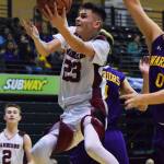 Nikolaevsk&rsquo;s Nikit Fefelov lays in a bucket against Hydaburg on Friday, March 17, 2017, at the Class 1A state tournament held at the Alaska Airlines Center in Anchorage. (Photo by Joey Klecka/Peninsula Clarion)