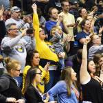 A crowd of Ninilchik supporters cheer on the Wolverines in the Class 1A boys state championship Saturday at the Alaska Airlines Center in Anchorage. (Photo by Joey Klecka/Peninsula Clarion)